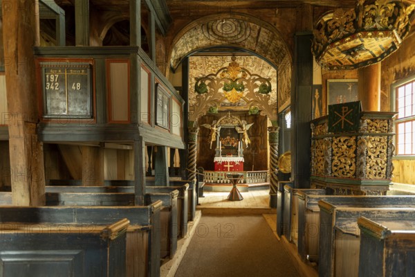 Interior with a view of the altar in Lom Stave Church (Lom stavkyrkje), Lom, Norway