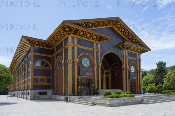 Decorated wooden building with decorative elements and an inviting entrance under a blue sky, Summer Theatre, Batumi, Black Sea, Ajara region, Adjara, Autonomous Republic, Georgia