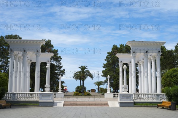 Classic column structure in the park with benches under a blue sky, colonnades, Batumi, Black Sea, Ajara region, Adjara, autonomous republic, Georgia