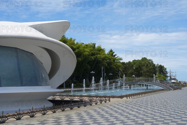 Futuristic building next to a fountain under a blue sky, left registry office, Batumi Boulevard, Batumi, Black Sea, Ajara region, Adjara, Autonomous Republic, Georgia
