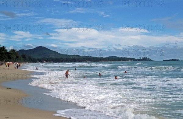 People, sea, surf, Chaweng Beach on Ko Samui, Thailand, December 2002, vintage, retro, old, historic