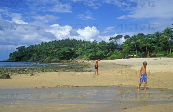 People, child, boy, beach at Coral Beach Resort on the island of Ko Lanta, Thailand, December 2002, vintage, retro, old, historic