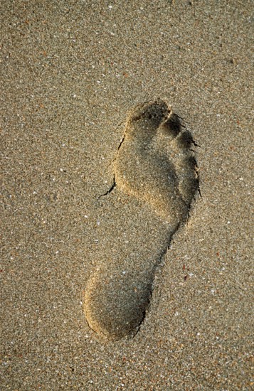 Footprint on the beach on the island of Ko Lanta, Thailand, December 2002, vintage, retro, old, historic