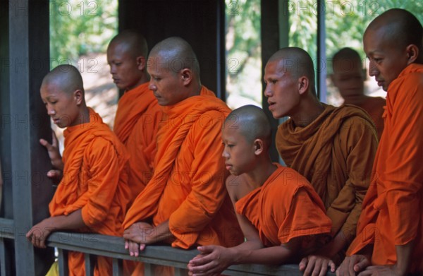 Monks watch performance, Samphran Elephant Ground and Zoo near Bangkok, Thailand, December 2002, vintage, retro, old, historic