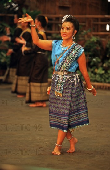 Performance of traditional dances in the Rose Garden near Bangkok, Thailand, December 2002, vintage, retro, old, historic