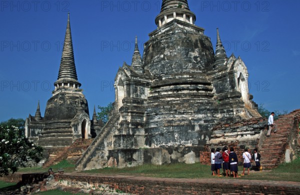People, girls, chedis at Wat Phra Si Sanphet, Ayutthaya, Thailand, December 2002, vintage, retro, old, historical