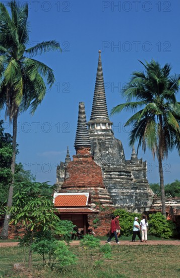 People, Chedis, palm trees at Wat Phra Si Sanphet, Ayutthaya, Thailand, December 2002, vintage, retro, old, historic