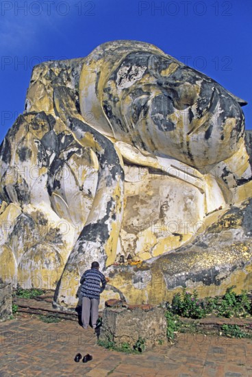 Believer, statue of the reclining Buddha, Ayutthaya, Thailand, December 2002, vintage, retro, old, historic