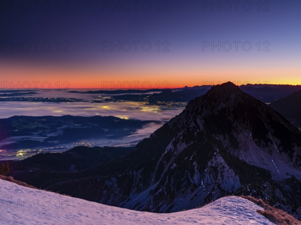 Dawn in the mountains, view of Salzburg with fog, Hochstaufen, Zwiesel, Bad Reichenhall, Berchtesgadener Land, Upper Bavaria, Bavaria, Germany