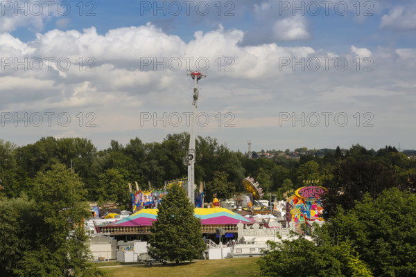 No limit carousel, fairground in Friedrichsau Ulm, folk festival, hustle and bustle, fair, amusement park, amusement attraction, ride, blue sky, clouds, Ulm, Baden-Württemberg, Germany