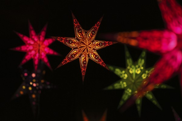Colorful Christmas stars, sales stand, baroque Christmas market, blue hour, dusk, Ludwigsburg, Baden-Württemberg, Germany