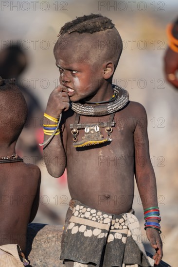 Portrait, young Himba child, traditional Himba village, Kaokoveld, Kunene, Namibia