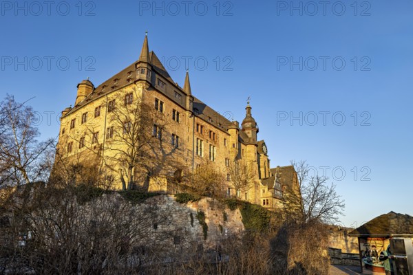 Majestic castle in Marburg in the warm light of the evening sun and a clear sky, The Landgrave Castle of Marburg in Hesse