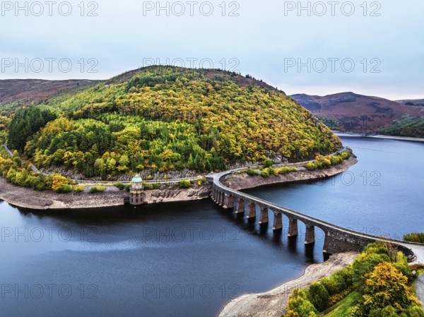 Autumn over Garreg Ddu Dam from a drone, Elan Valley, Caban-Coch Reservoir, Rhayader, Wales, UK