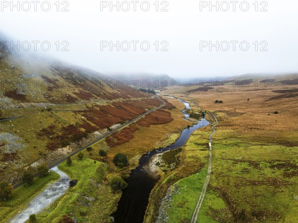 Autumn over Claerwen Dam, Claerwen Valley, Elan Valley Reservoir, Rhayader, Powys, Wales, UK