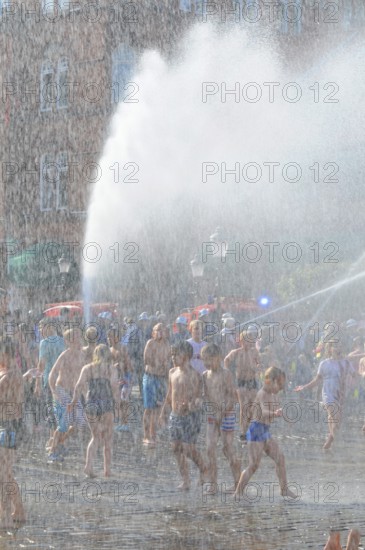 A popular event every year in August is when the Ystad Volunteer Fire Brigade takes the old fire pump made in 1850 to the square and sprays water on the assembled children, who are then baptized as true Ystad residents. Ystad, Skåne County, Sweden, Scandinavia