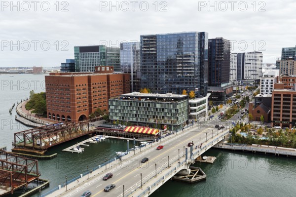 View of Northern Avenue Bridge over Fort Point Channel, steel swing bridge, Seaport District, skyline, modern architecture, office towers, residential buildings, cultural offerings, Downtown, Boston, Massachusetts, New England, USA