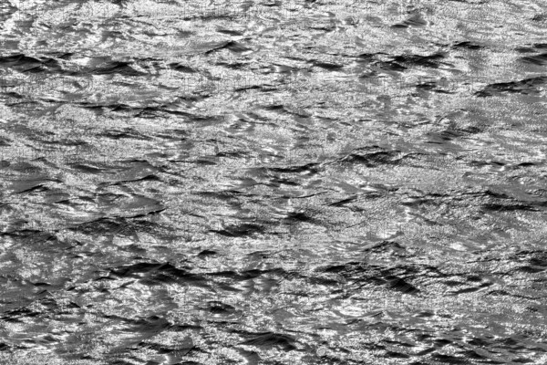 Water surface with waves and light reflections, black and white, Möhnesee, Möhnetalsperre, North Rhine-Westphalia, Germany