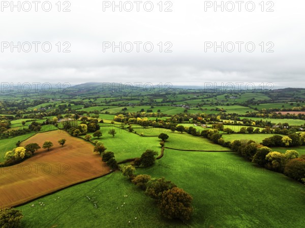 Autumn colours over Wales Farms and Fields from a drone, Grosmont, Abergavenny, Monmouthshire, Wales, UK