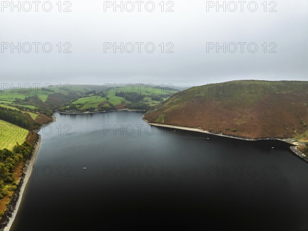 Autumn colours over Llyn Clywedog and Clywedog Reservoir from a drone, Llanidloes, Wales, UK