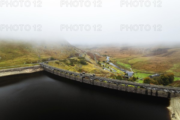 Autumn over Claerwen Dam, Claerwen Valley, Elan Valley Reservoir, Rhayader, Powys, Wales, UK