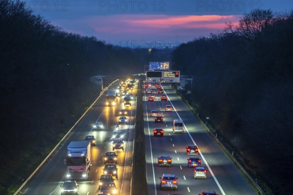 Evening traffic on the A52 motorway, between Düsseldorf and Essen, in front of the Breitscheid motorway junction, partly slow rush hour traffic, looking south, North Rhine-Westphalia, Germany