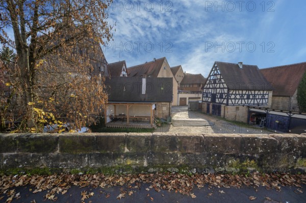 Historic city wall built in the 14th century, old town houses behind, Lauf an der Pegnitz, Middle Franconia, Bavaria, Germany