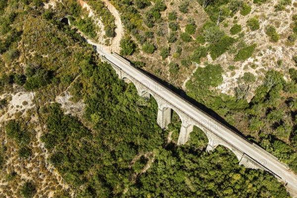 Cycle path Via Verde de la Sierra, Puerto Serrano to Olvera, old railroad track, cycle path on bridge, tunnel, near village Coripe, Andalusia, Spain
