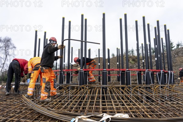 Assembly of reinforcing steel for the reinforced concrete foundation of a wind turbine, a mesh of rebar and rebar mesh, over 100 tons of reinforcing steel were used, the wind turbine will have a hub height of 160 meters, part of a new wind farm in Sauerland, near Balve, North Rhine-Westphalia, Germany