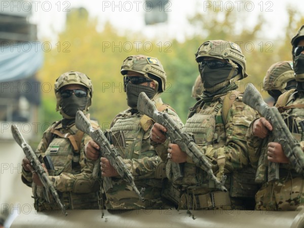 Aleppo, Syria – December 08, 2025: The Syrian Army and Public Security forces hold a military parade marking the first anniversary of the Syrian revolution's victory and the fall of the Assad regime, attended by thousands of people, Aleppo, Aleppo, Syria