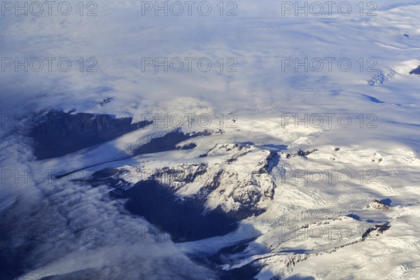 View of glaciers, structures, rocks in ice, snowfields, aerial view, Icelandic highlands, Iceland