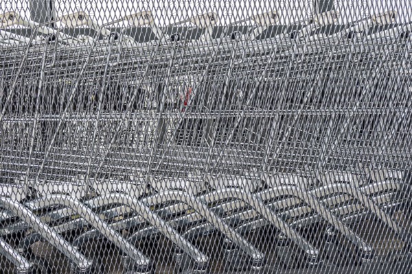 Close-up of several unused shopping carts, economic crisis, consumption