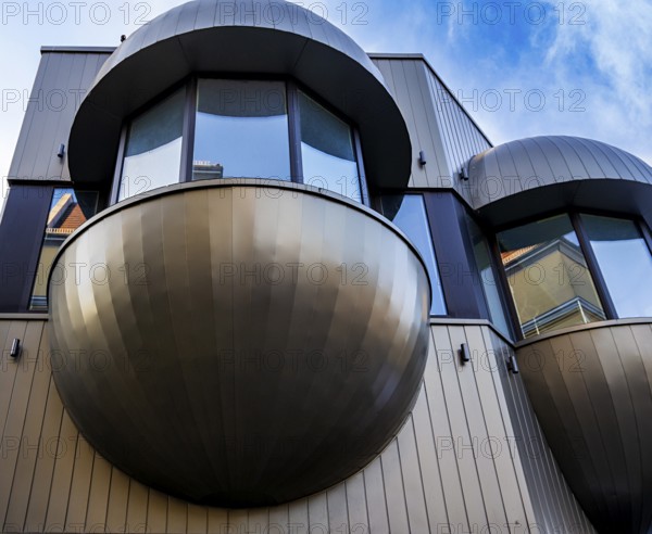 Futuristic balconies with bay windows on a prefabricated building from the sixties in Nikolaiviertel, Berlin, Germany