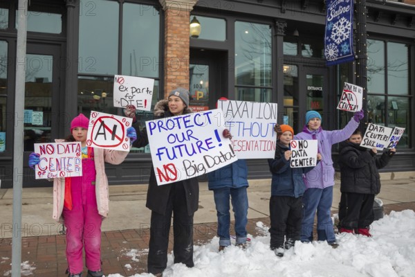 Saline, Michigan USA - 1 December 2025 - Rural Michigan residents rally against the $7 billion Stargate data center planned on southeast Michigan farm land. Protesters say the Data Center is being fast tracked by DTE Energy, the large electric utility, and that it could raise residential electricity rates and endanger the water supply