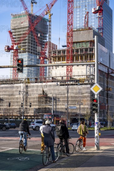 Construction site of the Covivio skyscraper in front, in the vicinity of Alexanderplatz in Berlin, mixed use of apartment, offices, retail and a daycare center, the high-rise construction site of The Berlinian office high-rise building in the back, Germany