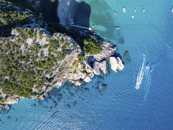 Picturesque rocky coast, cliffs and Cala Luna beach, aerial view, top-down, Golfo di Orosei, Baunei, Sardinia, Italy