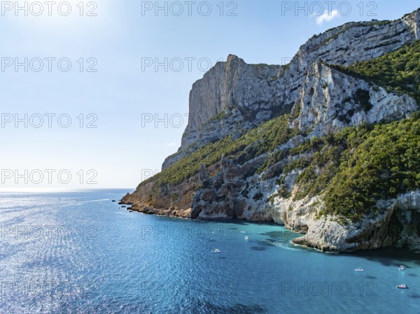 Picturesque rocky coast, cliffs and turquoise blue sea, aerial view, Golfo di Orosei, Baunei, Sardinia, Italy