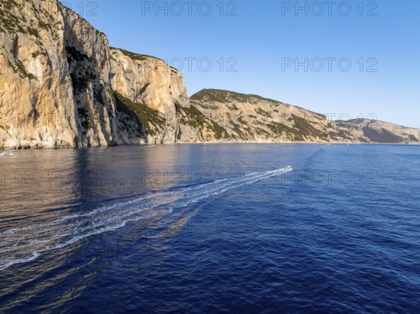 Motorboat rides on picturesque rocky coast ImmorgenLicht, cliffs, Golfo di Orosei, Baunei, Sardinia, Italy