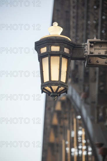 Details of the famous Sydney Harbour Bridge in the evening light, New South Wales, Australia. Decorative lamp on steel arm with studs