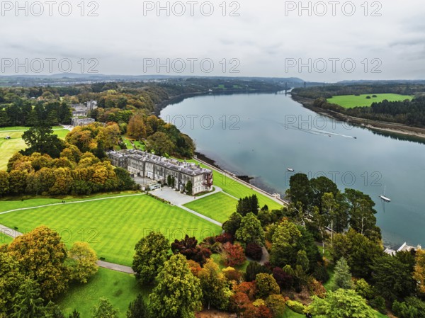 Autumn over Plas Newydd House from a drone, Gardens and Parkland, Llanfairpwllgwyngyll, Anglesey, Wales, UK