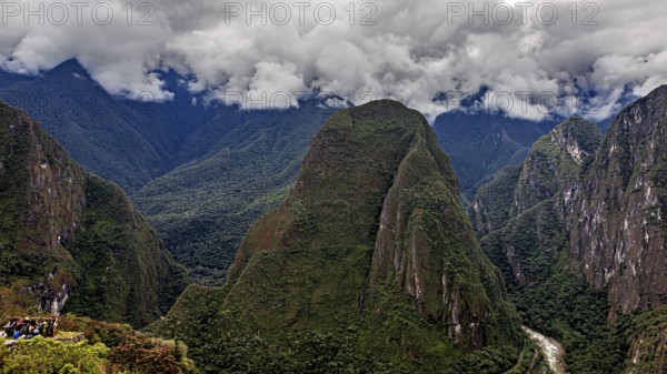 Impressive mountain landscape under dramatic clouds, The Urubamba Valley near Machu Picchu in Peru