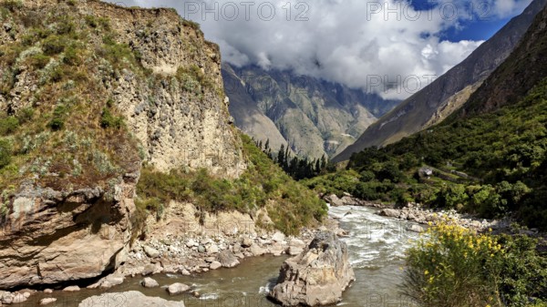 River flows through impressive rocky landscape, The Urubamba Valley near Machu Picchu in Peru