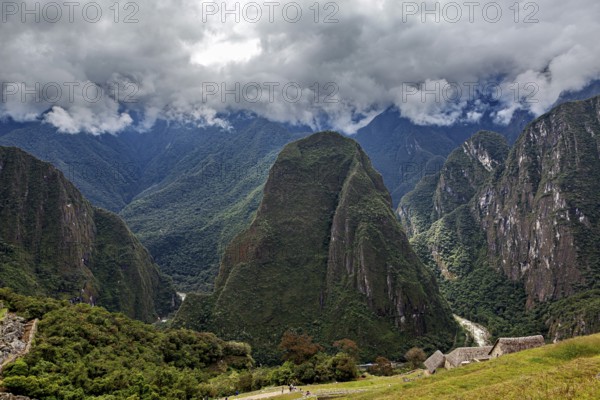 Majestic mountains under dramatic cloudy skies, The Urubamba Valley near Machu Picchu in Peru