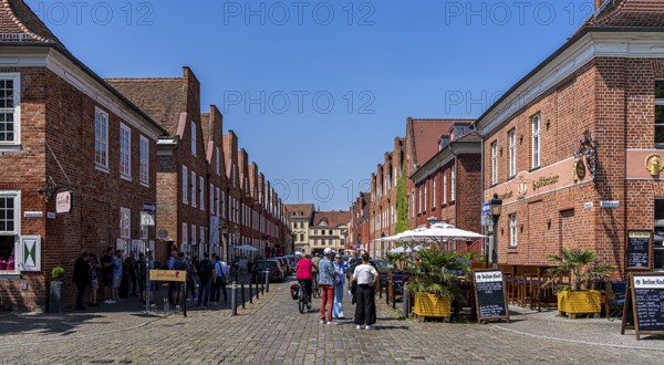 Catering, retail and typical, historic architecture in the Dutch Quarter in Potsdam, Brandenburg, Germany