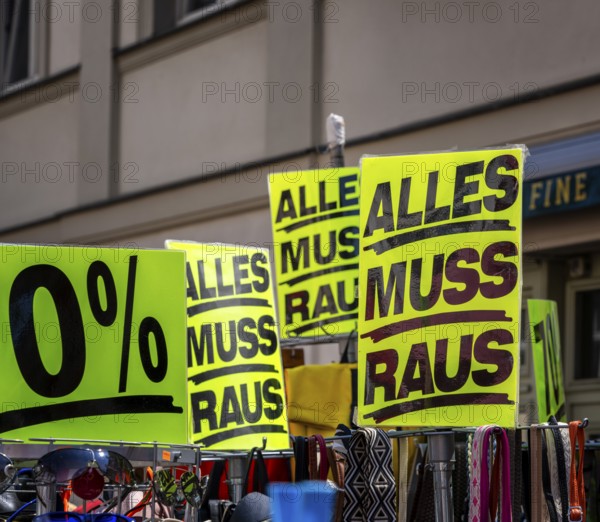 Retail trade with signs for price reductions and discounts, Potsdam, Brandenburg, Germany
