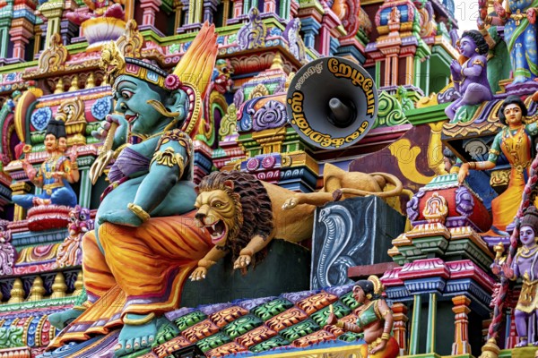 A lively temple front with colorful sculptures and mythological representations, The Sri Pathrakali Amman Trincomalee in Sri Lanka