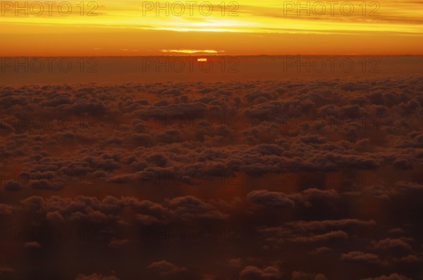 View from airplane window at sunrise