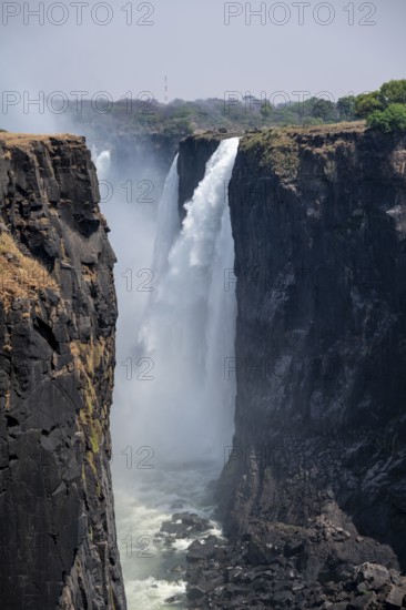 Water plunges into the depths, Victoria Falls with gorge, Zambezi, Zimbabwe
