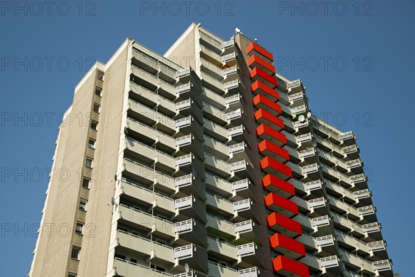 High-rise apartment building with balconies and satellite dishes, satellite town of Chorweiler in Cologne, North Rhine-Westphalia, Germany