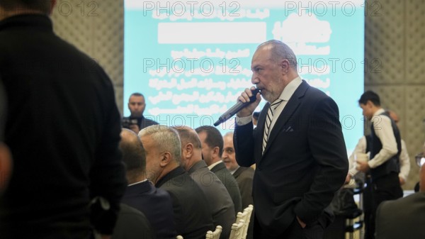 Gaziantep, Turkey – November 20, 2025: Syrian expatriates took part in a dedicated fundraising session aimed at supporting Aleppo's reconstruction efforts, attended by Syrian and Turkish officials. Participants watched a presentation highlighting key scenes from the city's wartime destruction, underscoring ongoing joint efforts to rebuild what was lost, Gaziantep, Gaziantep, Turkey